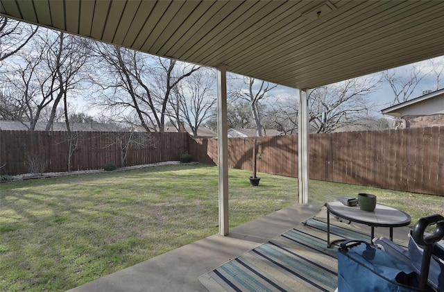 view of yard with a fenced backyard and a patio