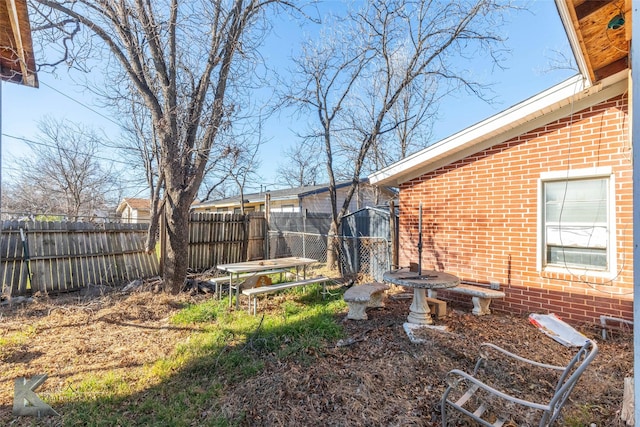 view of yard with fence