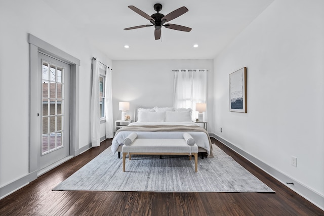 bedroom featuring recessed lighting, wood finished floors, a ceiling fan, baseboards, and access to outside