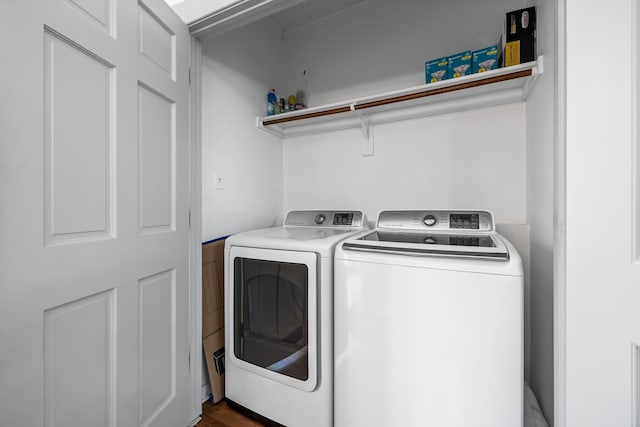 laundry area featuring laundry area and washer and clothes dryer