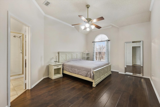 bedroom featuring dark wood-style floors, baseboards, and visible vents