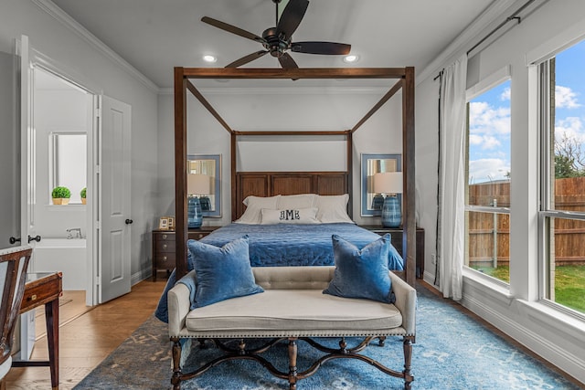 bedroom featuring recessed lighting, wood finished floors, a ceiling fan, baseboards, and ornamental molding