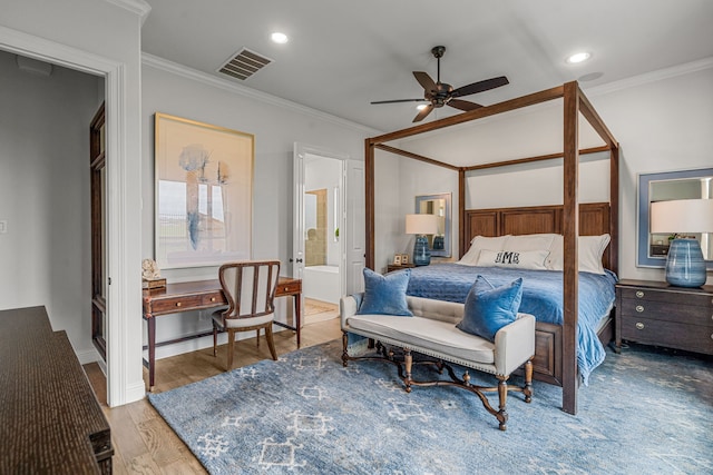 bedroom with crown molding, visible vents, wood finished floors, and recessed lighting