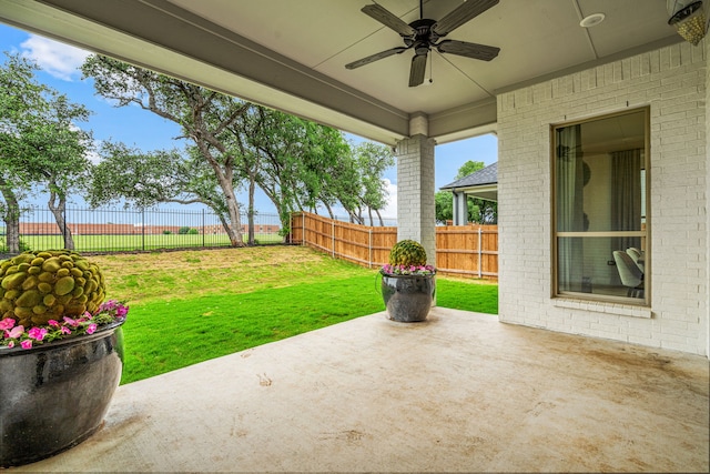 view of patio / terrace with ceiling fan and a fenced backyard