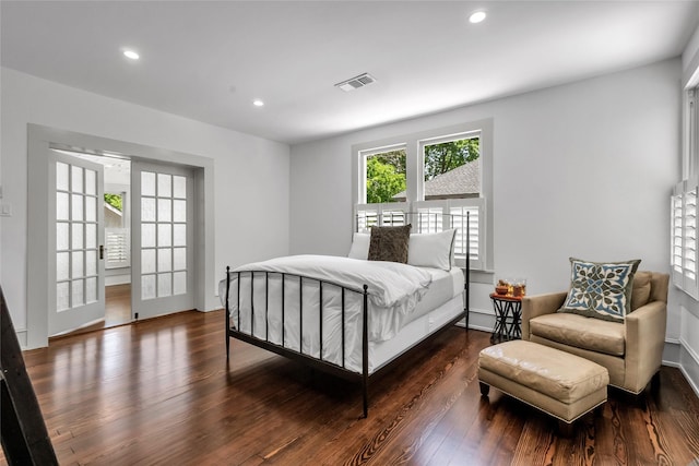 bedroom featuring recessed lighting, dark wood-style flooring, and visible vents