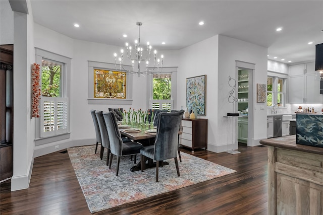 dining room featuring dark wood-type flooring, recessed lighting, and baseboards