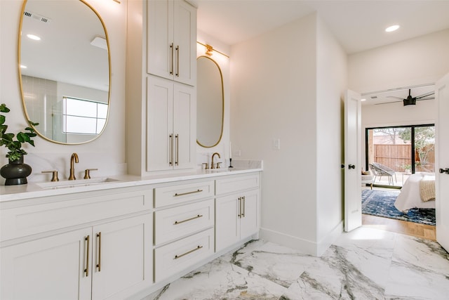 full bathroom with marble finish floor, visible vents, a sink, and recessed lighting