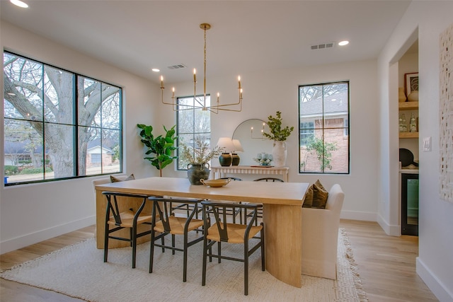 dining space featuring recessed lighting, baseboards, visible vents, and light wood finished floors