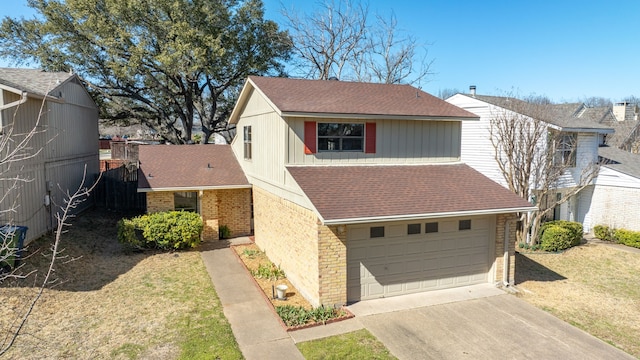 traditional-style house featuring driveway, roof with shingles, an attached garage, and brick siding