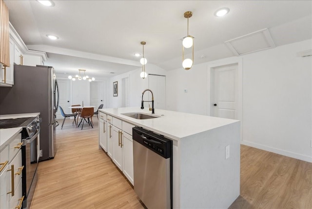 kitchen featuring light wood finished floors, electric range, white cabinets, a sink, and dishwasher