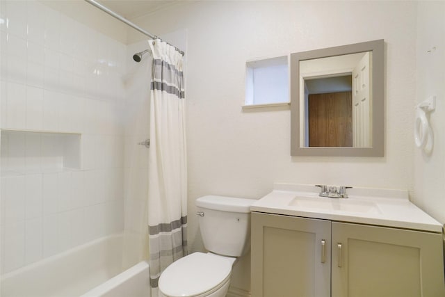 full bath featuring shower / bath combo, vanity, and toilet