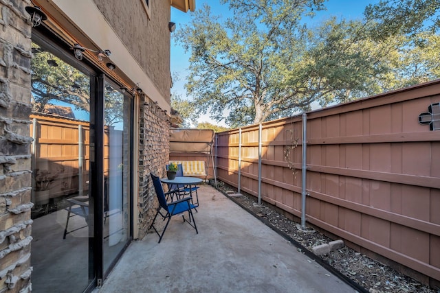 view of patio with a fenced backyard