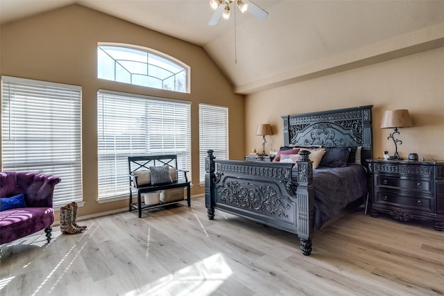 bedroom featuring ceiling fan, high vaulted ceiling, and wood finished floors