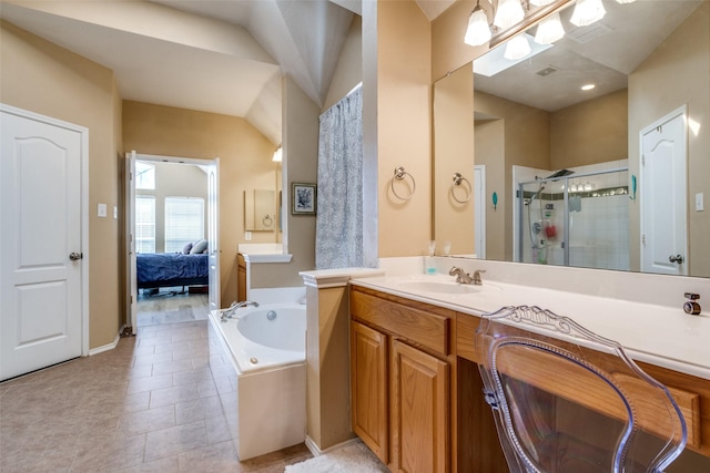 full bath featuring connected bathroom, tile patterned floors, vanity, a shower stall, and a bath