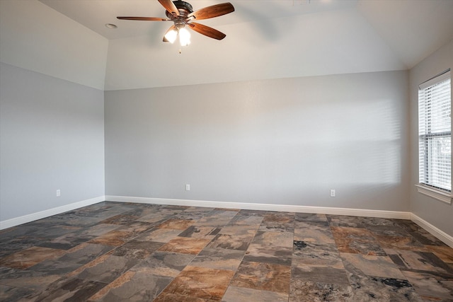 510 Meadow Pond Ct, Runaway Bay, TX 76426 - spare room featuring vaulted ceiling, a ceiling fan, baseboards, and stone finish flooring