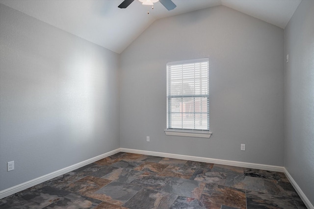 510 Meadow Pond Ct, Runaway Bay, TX 76426 - spare room featuring lofted ceiling, stone finish floor, a ceiling fan, and baseboards