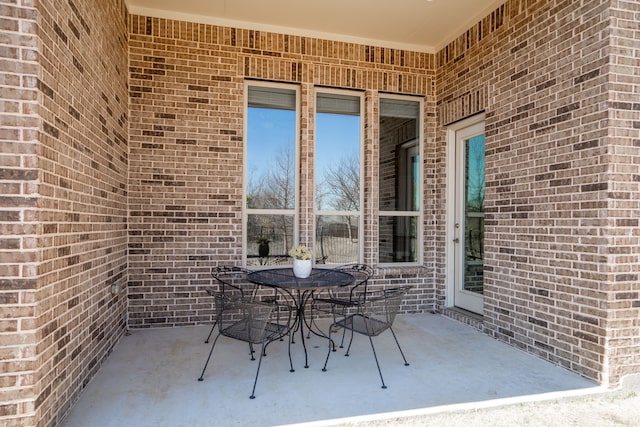 view of patio with outdoor dining area