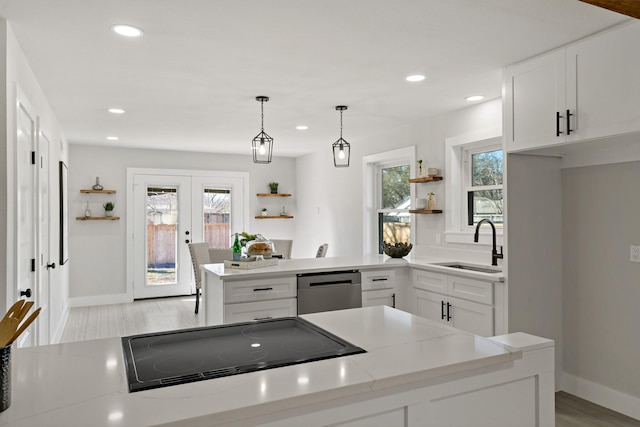 kitchen with black electric cooktop, a sink, stainless steel dishwasher, french doors, and open shelves