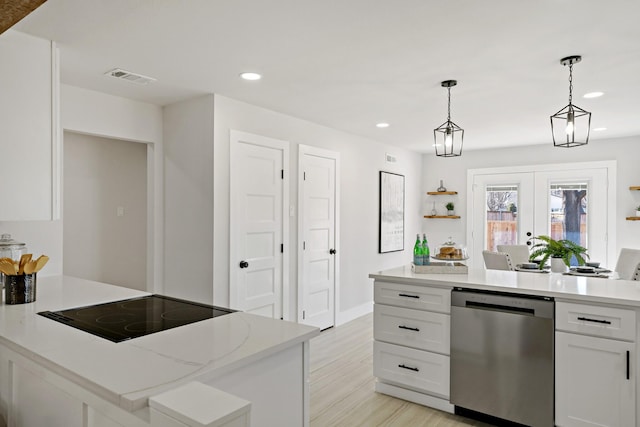 kitchen with visible vents, white cabinets, dishwasher, a peninsula, and black electric cooktop