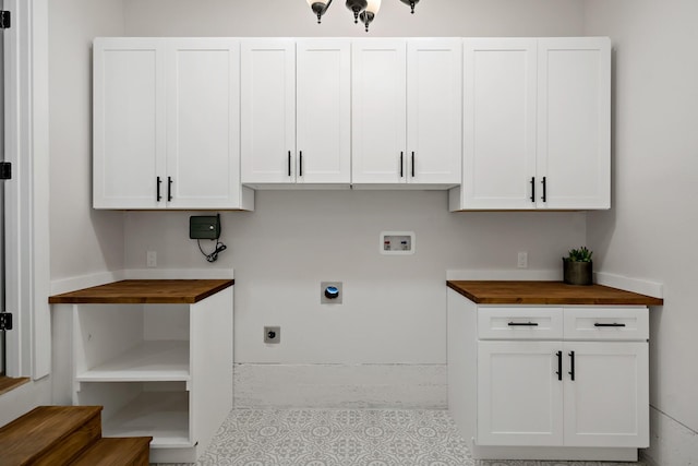 laundry area with hookup for a washing machine, cabinet space, and hookup for an electric dryer