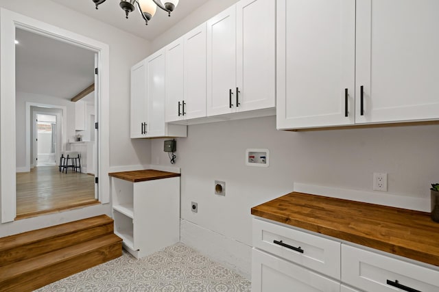 laundry room featuring washer hookup, cabinet space, and hookup for an electric dryer