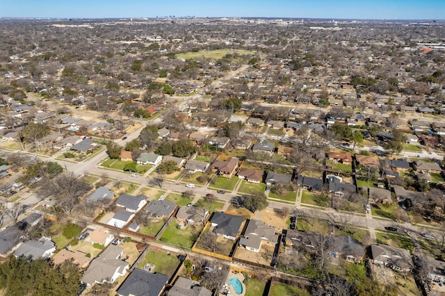 birds eye view of property with a residential view