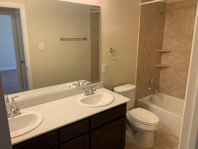 full bath featuring double vanity, shower / washtub combination, toilet, and a sink