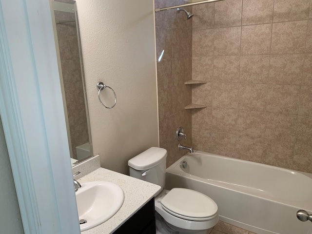 full bathroom with tub / shower combination, toilet, and vanity