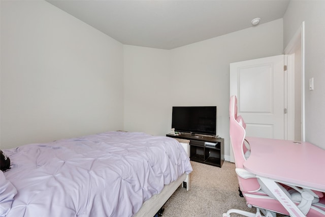 bedroom with light colored carpet