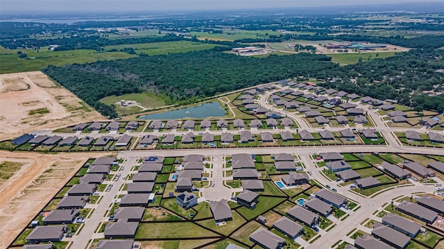 birds eye view of property featuring a residential view and a water view