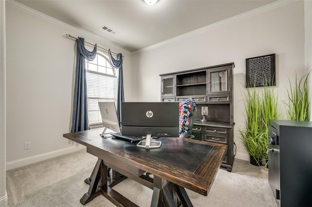 office featuring light carpet, ornamental molding, visible vents, and baseboards