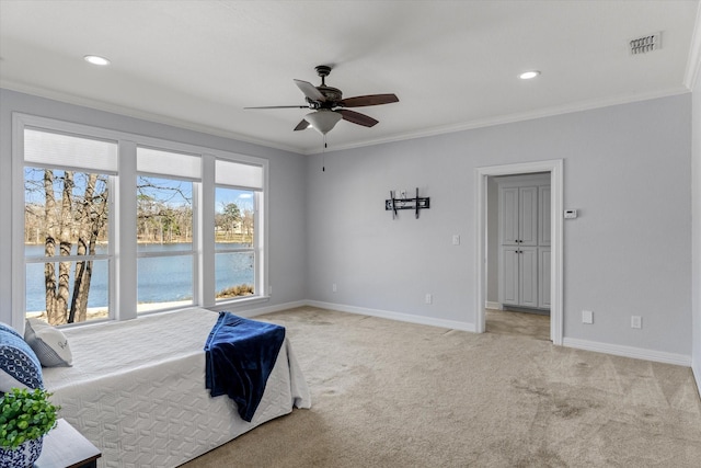 bedroom with recessed lighting, light carpet, visible vents, baseboards, and ornamental molding