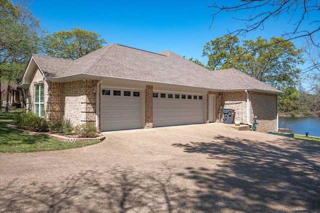 view of front facade featuring a front yard and brick siding