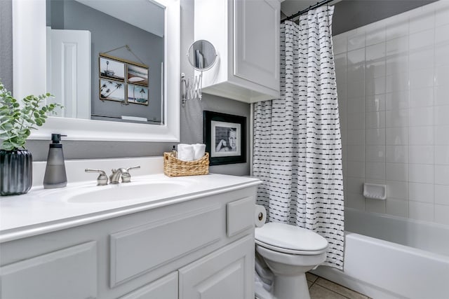 full bathroom featuring shower / tub combo, tile patterned flooring, vanity, and toilet