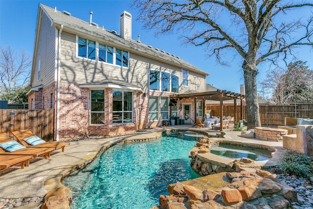 back of property featuring brick siding, a chimney, a patio area, a pergola, and a fenced backyard