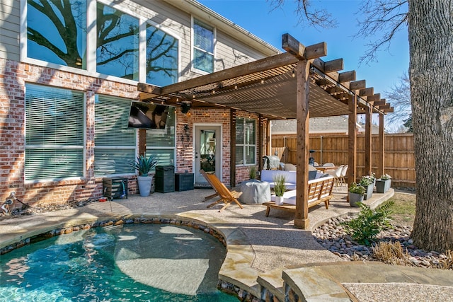 rear view of property with a patio area, brick siding, fence, and a pergola