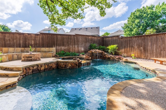 905 Water Oak Dr, Grapevine, TX 76051 - view of swimming pool featuring a fenced backyard, an outdoor fire pit, a pool with connected hot tub, and a patio