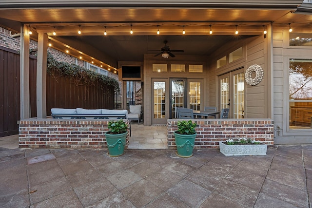 view of patio / terrace featuring an outdoor hangout area, a ceiling fan, and fence