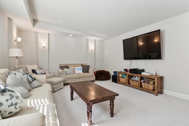 living area with carpet floors and baseboards