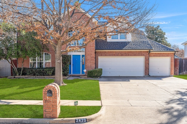 view of front facade featuring driveway, a garage, roof with shingles, a front yard, and brick siding