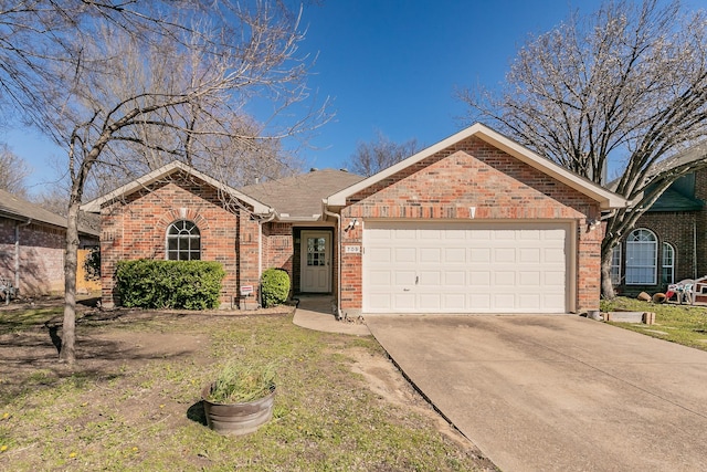 ranch-style house with a garage, concrete driveway, and brick siding