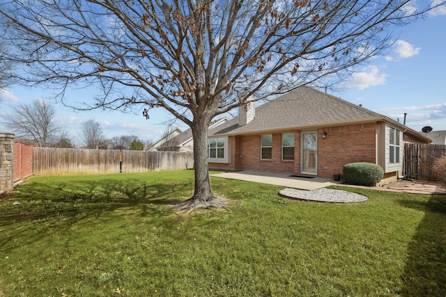 exterior space featuring a patio and a fenced backyard