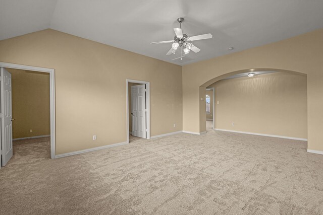 3054 Oakwood Dr, Celina, TX 75009 - carpeted spare room featuring arched walkways, baseboards, lofted ceiling, and ceiling fan