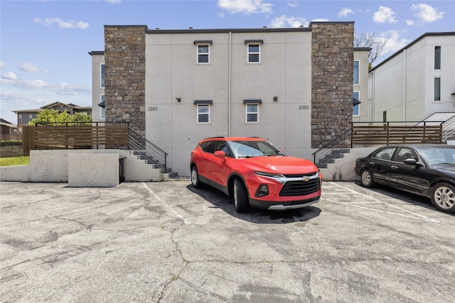 view of uncovered parking lot
