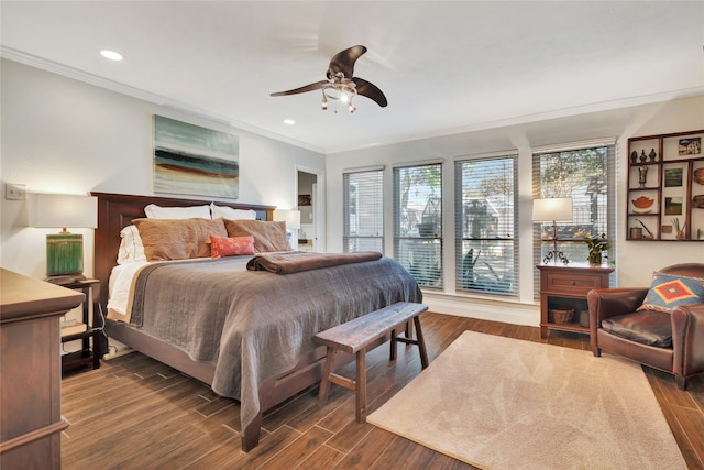 bedroom with ornamental molding, dark wood-type flooring, and recessed lighting