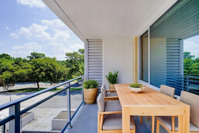 balcony featuring outdoor dining area