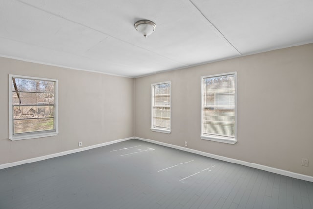 6518 Meade St, Dallas, TX 75232 - spare room with wood finished floors and baseboards