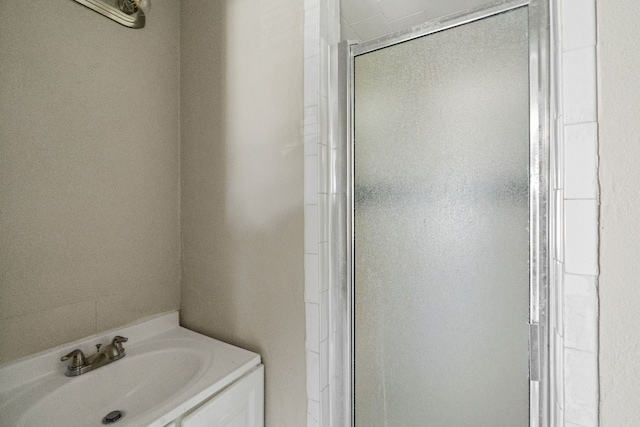 6518 Meade St, Dallas, TX 75232 - full bathroom with a sink and a shower stall