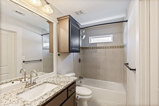 full bathroom featuring vanity,  shower combination, toilet, and visible vents