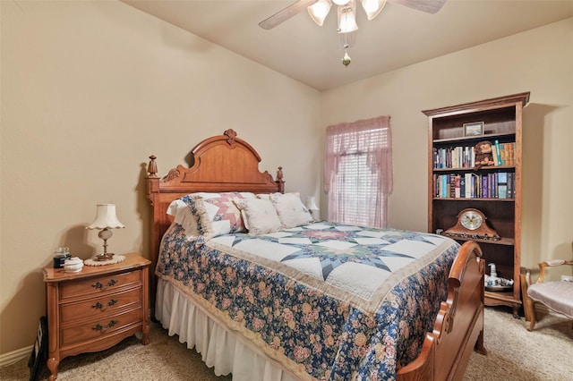 bedroom with light colored carpet and ceiling fan